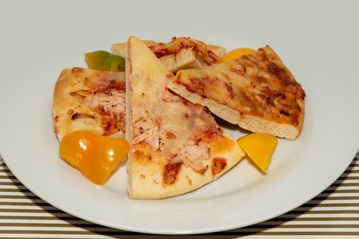 Pizza s drůbeží šunkou a sýrem * 1,7